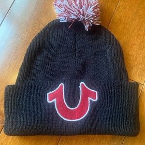 True Religion winter hat. New without tags. Red, black and white.